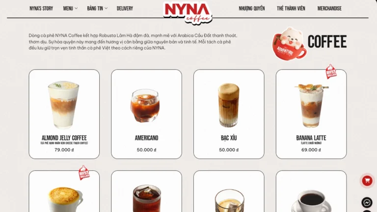 Thiết kế web quán cafe NYNA: visual tối giản trắng đen, mascot dễ thương, nhận diện thương hiệu mạnh